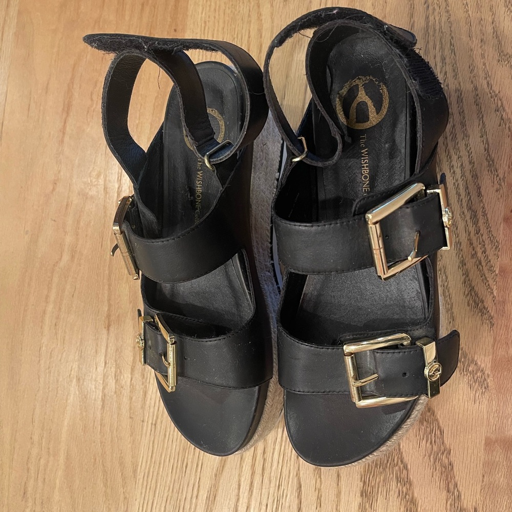 Stylish Black Sandals with Gold Accents